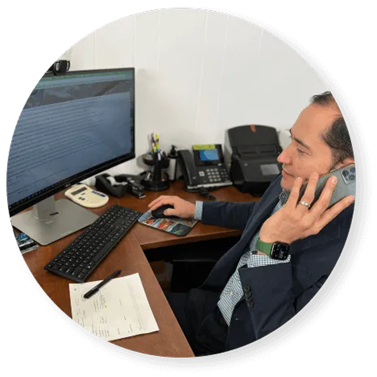 ACG Insurance agent at desk handling SR22 filing by phone
